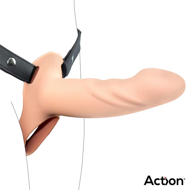 Harnais à sangles noires et gode creux en silicone beige, sur fond blanc