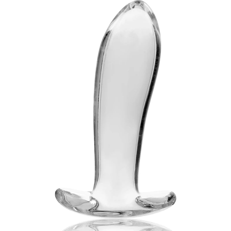 Plug anal en verre transparent avec forme allongée et base plate posé sur fond neutre