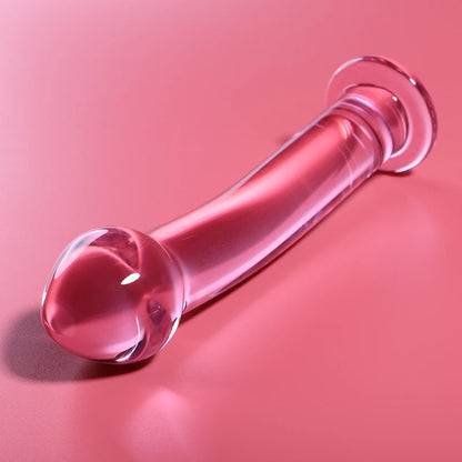  Gode 16 cm en verre rose – texture lisse et tête réaliste allongé sur fond rose