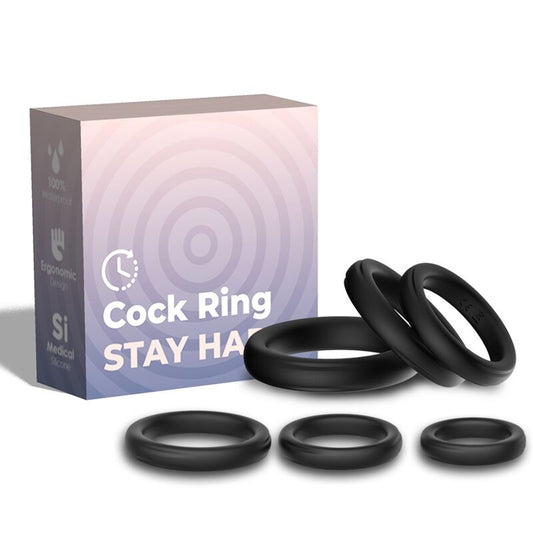 Coffret de penisrings noirs en silicone, présenté avec plusieurs anneaux de diamètres différents, forme circulaire lisse et finition mate