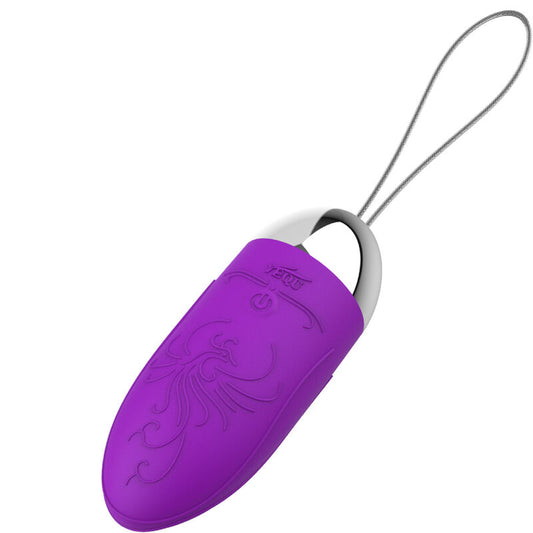 Œuf qui vibre violet en silicone lisse avec motifs discrets en relief, forme ovoïde allongée et cordon de retrait translucide