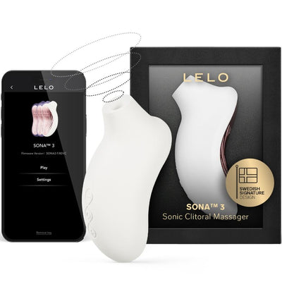 Stimulateur clitoridien LELO blanc avec application mobile affichée sur smartphone et représentation dans sa boîte
