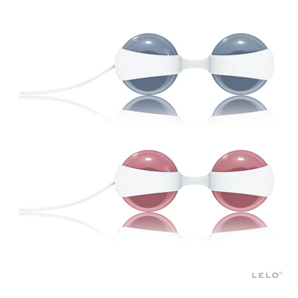 Boules de Geisha pastel bleu et rose présentées en vue séparée montrant les demi-coques