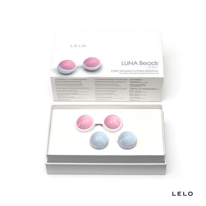 Coffret blanc LELO ouvert contenant boules de geisha rose et bleu 
