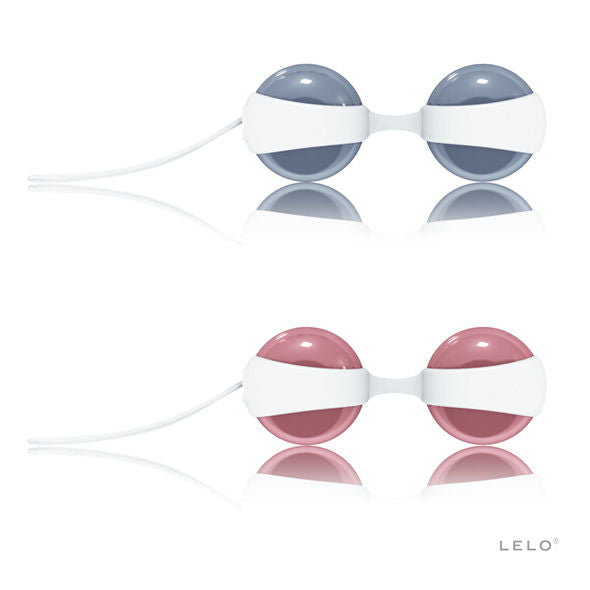 Demi-boules rose et bleu présentées en vue éclatée sur fond blanc