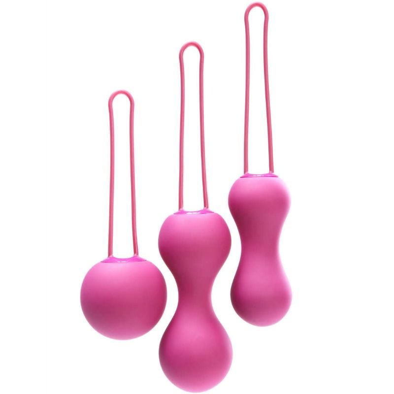 Lot de trois boules de Kegel roses en silicone avec cordon de retrait vue de face sur fond blanc
